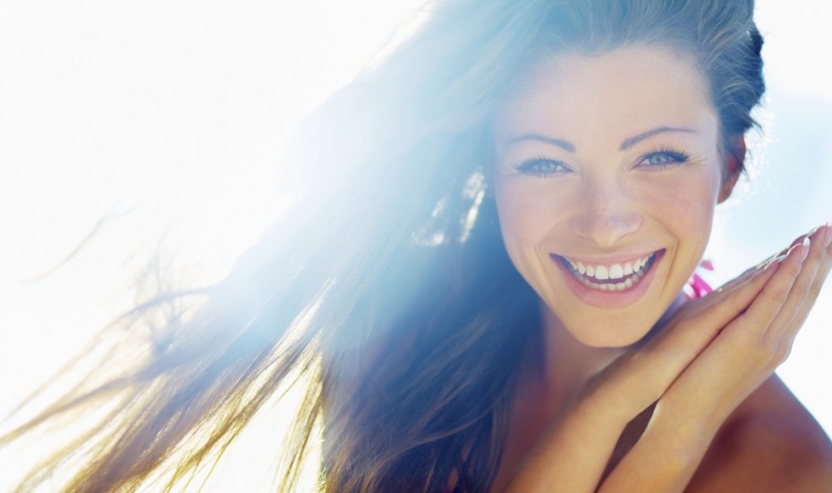 Closeup of a beautiful smiling young woman