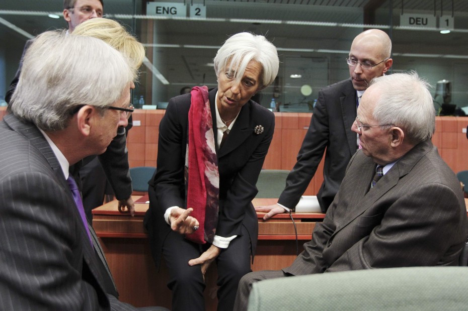 IMF President Lagarde talks to Eurozone finance ministers during an eurozone finance ministers' meeting in Brussels