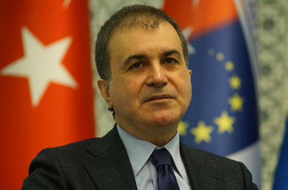 Turkey's Minister for EU Affairs Omer Celik reacts during an interview with Reuters in Ankara