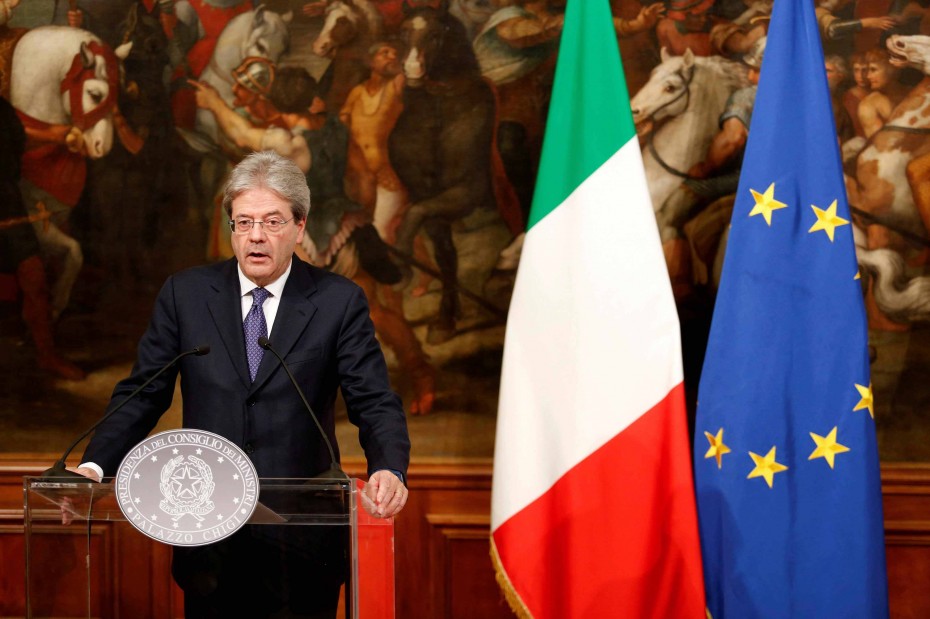 FILE PHOTO: Italian Prime Minister Paolo Gentiloni attends a news conference