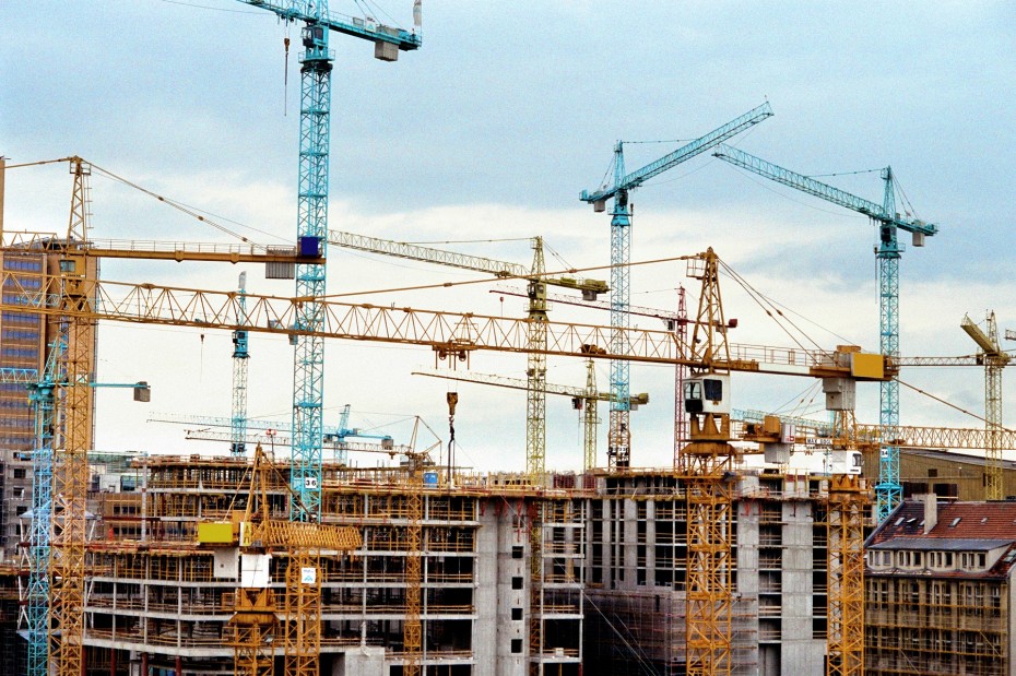 Cranes at building construction site, Berlin, Germany
