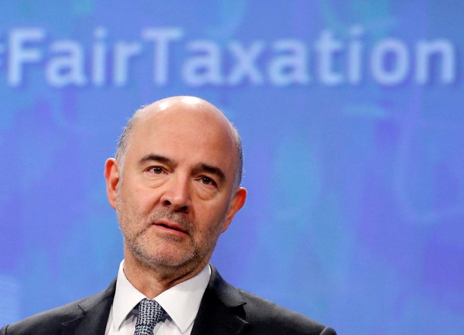 EU Commissioner Moscovici addresses a news conference in Brussels