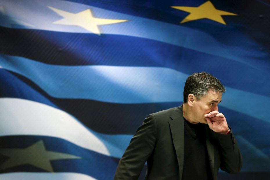 Greek Finance Minister Tsakalotos arrives for a news conference at the ministry in Athens