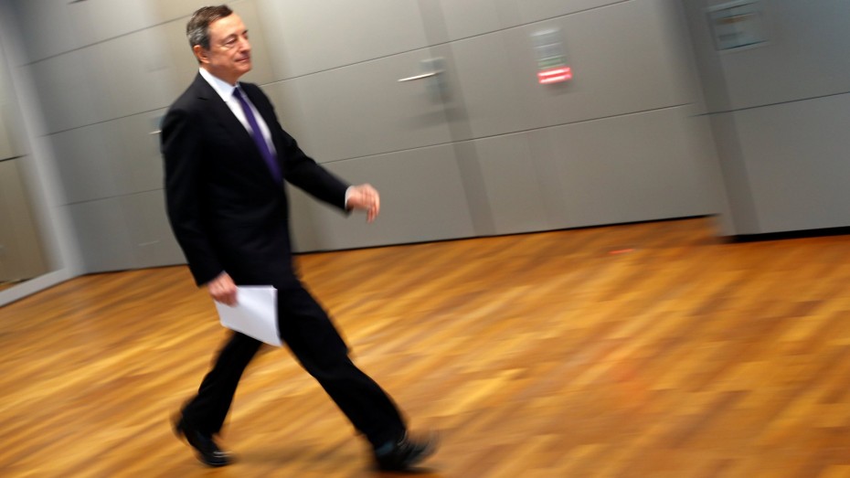 European Central Bank (ECB) President Mario Draghi arrives for a news conference following the governing council's interest rate decision at the ECB headquarters in Frankfurt