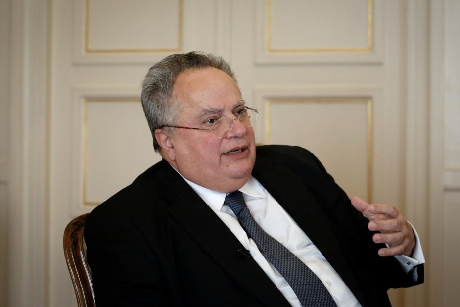 Greek Foreign Minister Nikos Kotzias speaks during an interview with Reuters at the Foreign Ministry in Athens